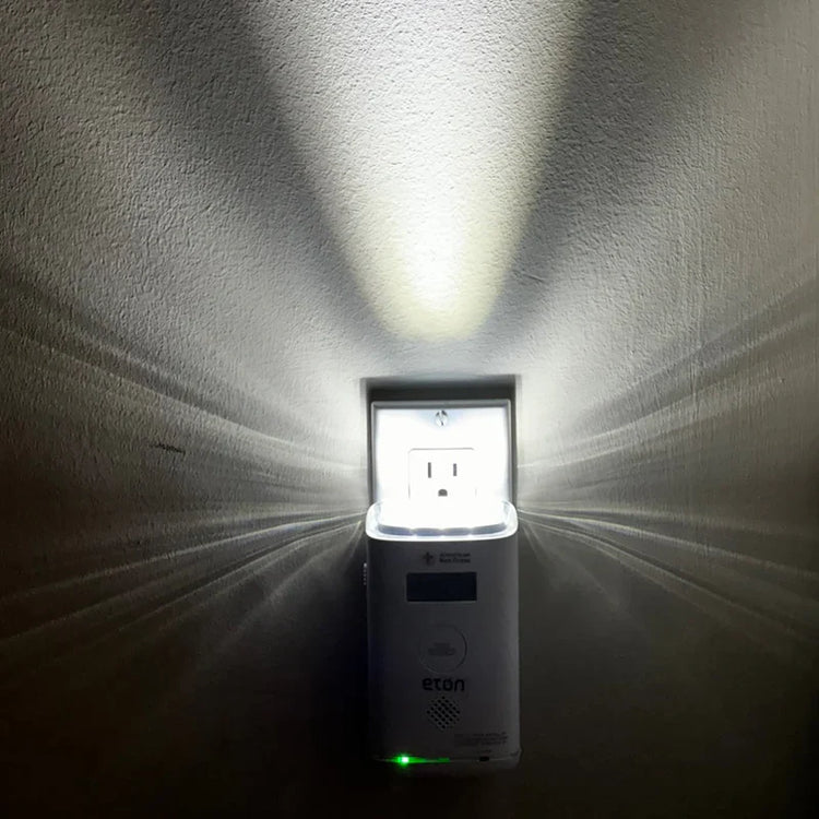 Eton night light emitting a bright beam on a textured wall