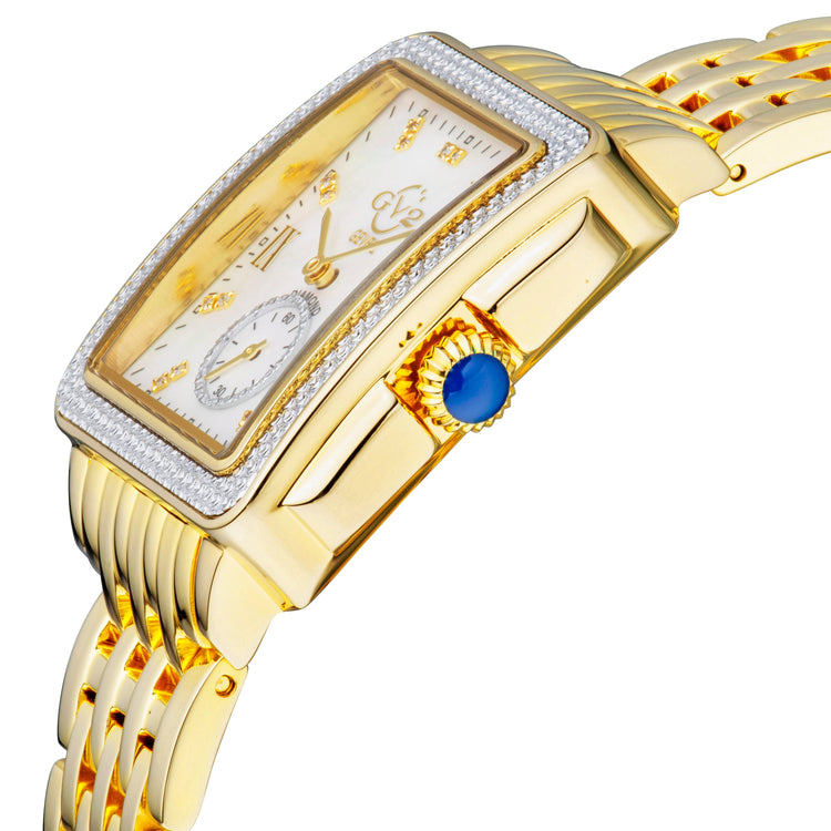 Gold wristwatch with a blue gemstone on a white background