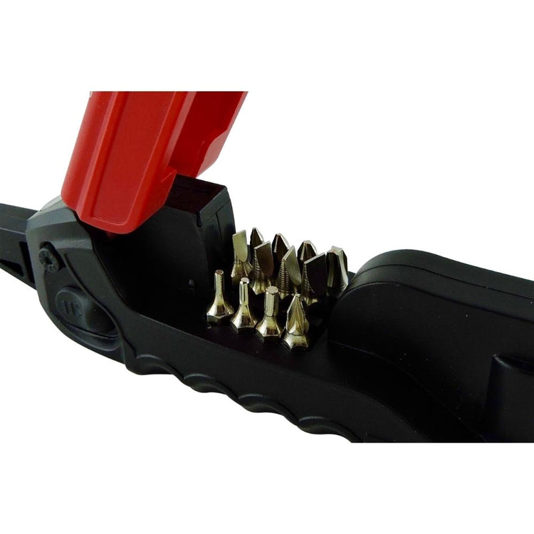 Close-up of a black and red tool with metallic spikes on a white background