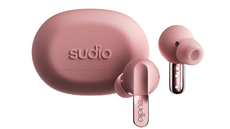 Pink wireless earbuds with charging case on a white background