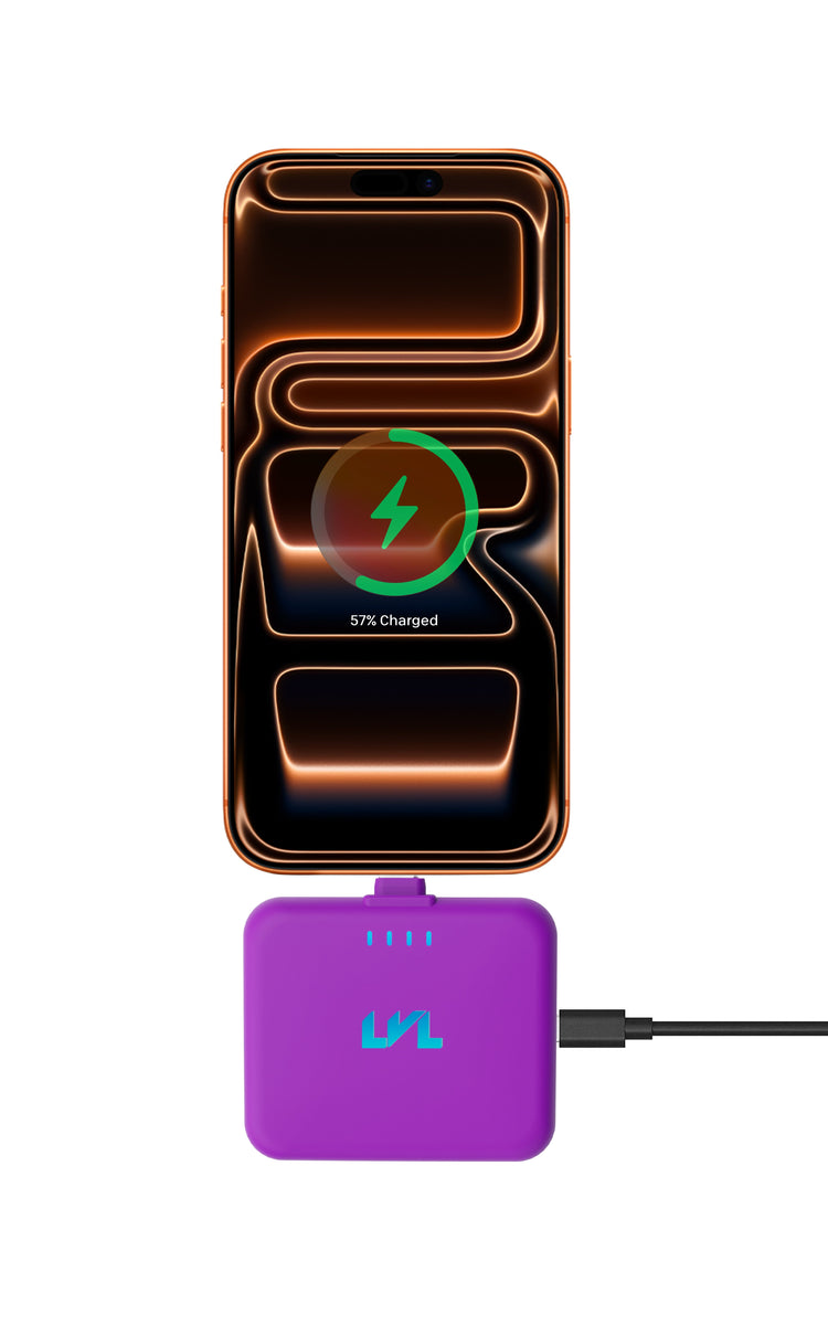 Smartphone with wireless charging pad on a white background