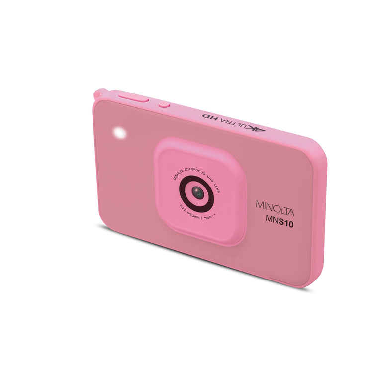 Pink digital camera on a white background