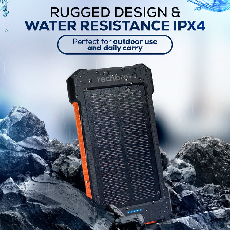 Solar power bank with rugged design and water resistance IPX4 rating on a rocky background