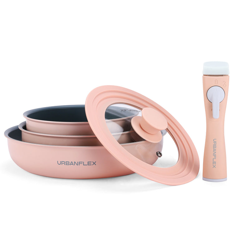 Set of pink cookware with lids and a matching bottle on a white background, featuring the Urbanflex brand.