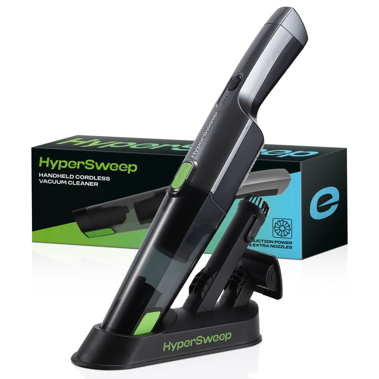 Handheld cordless vacuum cleaner branded HyperSweep on its charging stand, with a green accent and the product packaging box in the background.