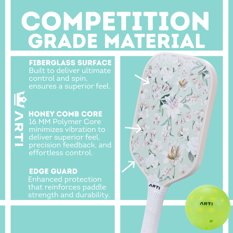 Pickleball paddle with floral design and green ball on a teal background, featuring ARTI branding.
