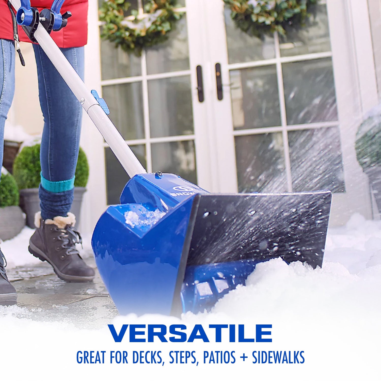 Person using a blue snow shovel to clear snow, with text 'VERSATILE GREAT FOR DECKS, STEPS, PATIOS + SIDEWALKS' on a white background.