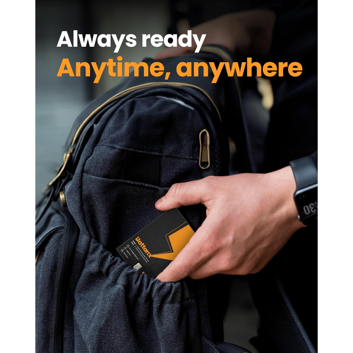Person placing a device into a backpack with text 'Always ready, Anytime, anywhere' on a blurred background.