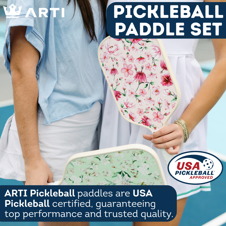 Floral pickleball paddle set with USA Pickleball certification logo, held by a person.