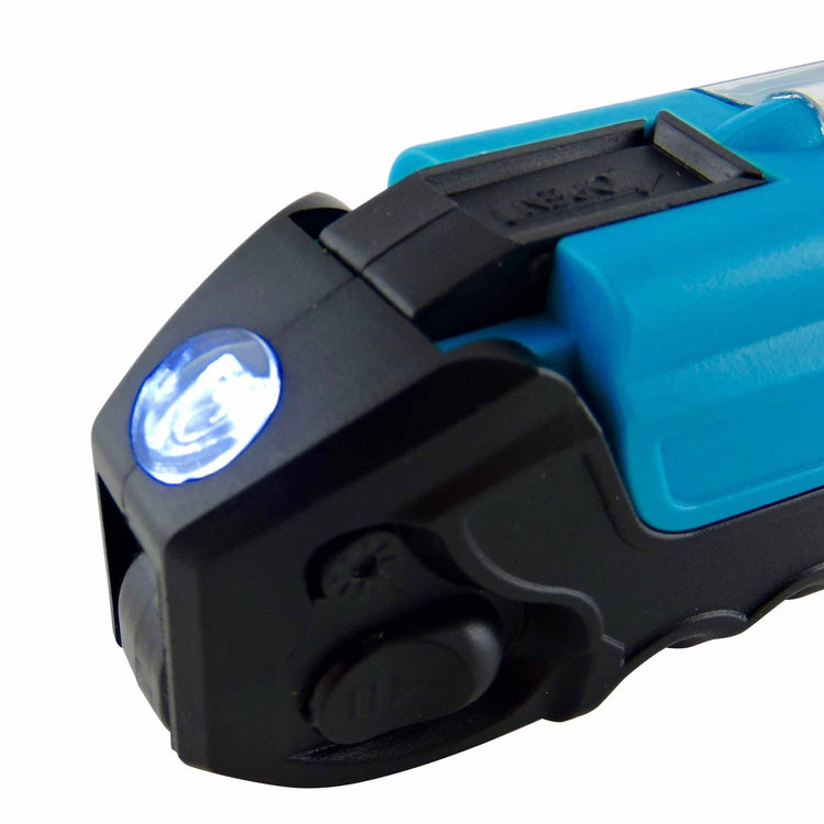 Close-up of a blue and black pocket knife with a light on a white background