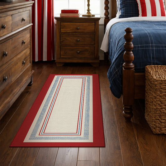 Wooden bench with striped cushions in a room with a red and white patterned rug.