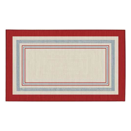 Wooden bench with striped cushions in a room with a red and white patterned rug.