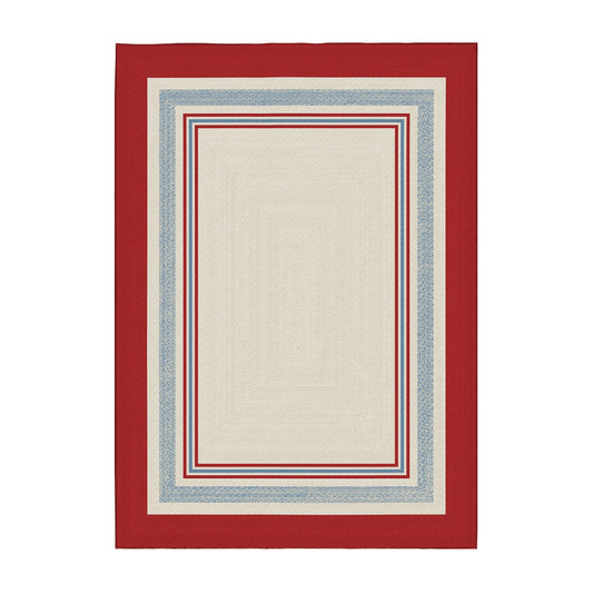 Wooden bench with striped cushions in a room with a red and white patterned rug.