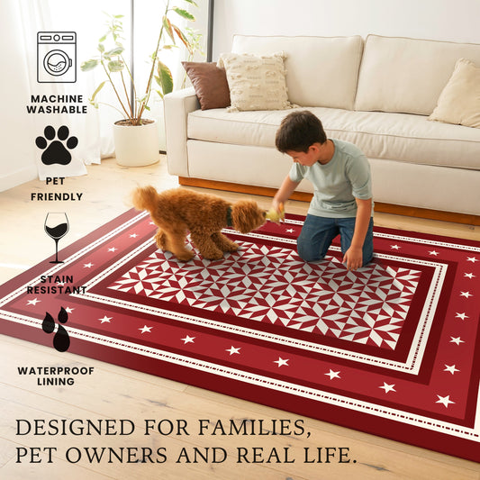 Decorative red and white patterned rug on a wooden floor in a kitchen.