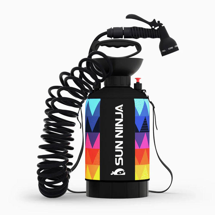 Spray bottle with colorful design and coiled hose on a white background