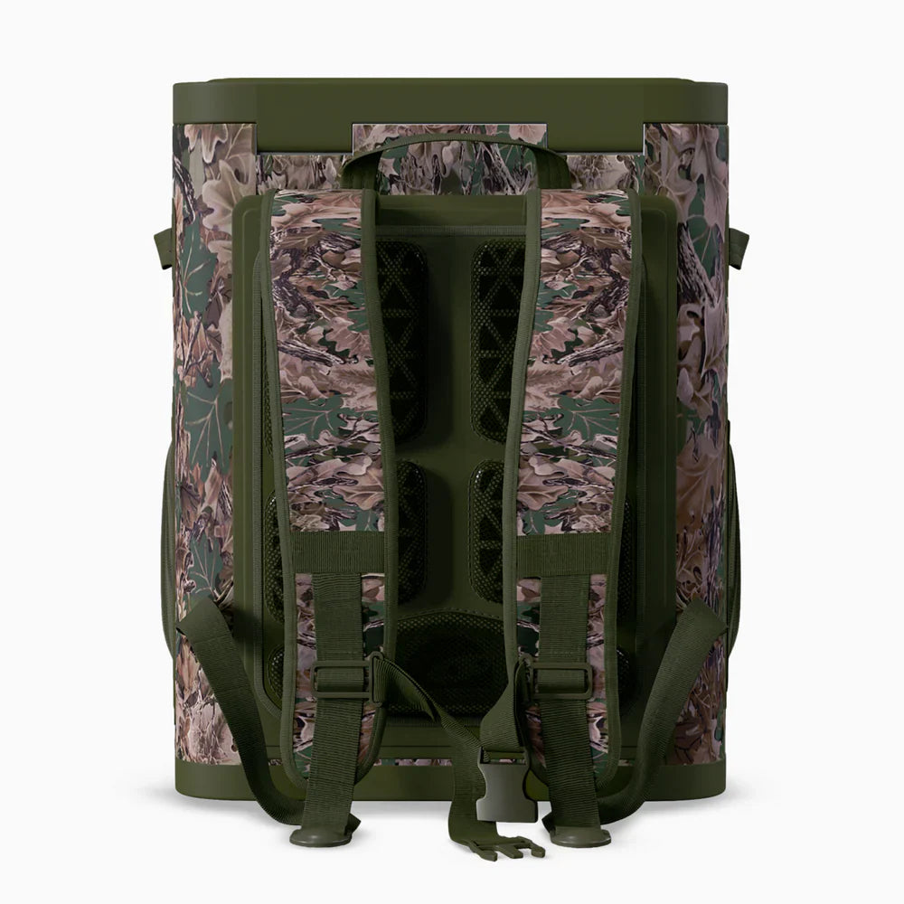 Camouflage backpack with green straps on a white background