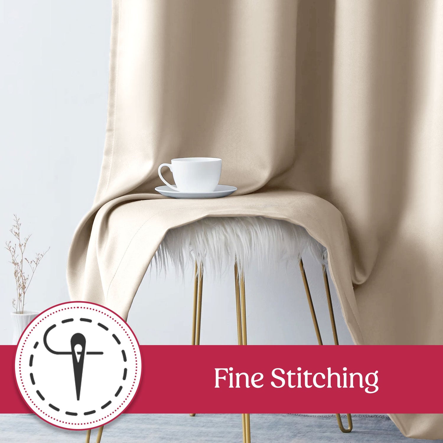 Beige blanket draped over a chair with a cup on a saucer, featuring 'Fine Stitching' logo.
