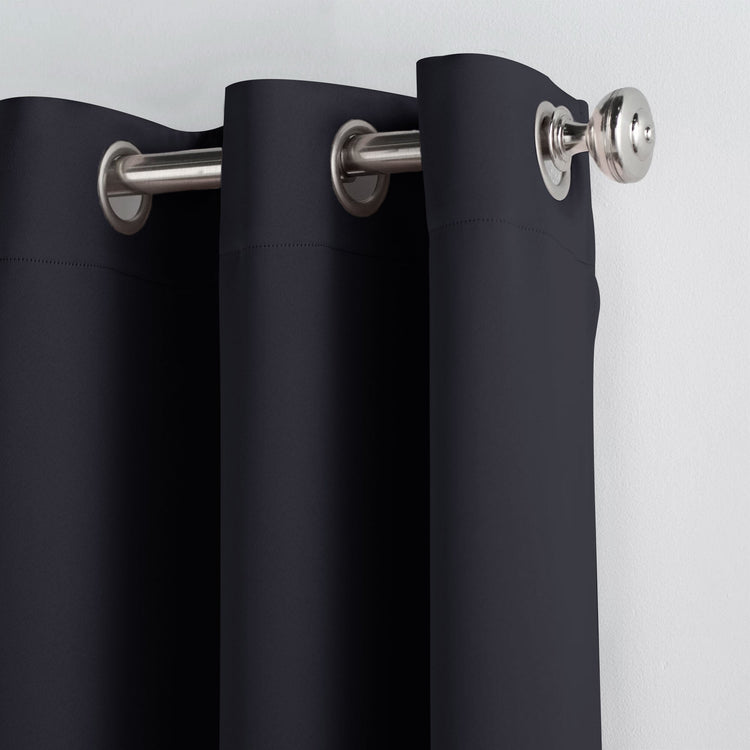 Black curtains with silver rings on a white background