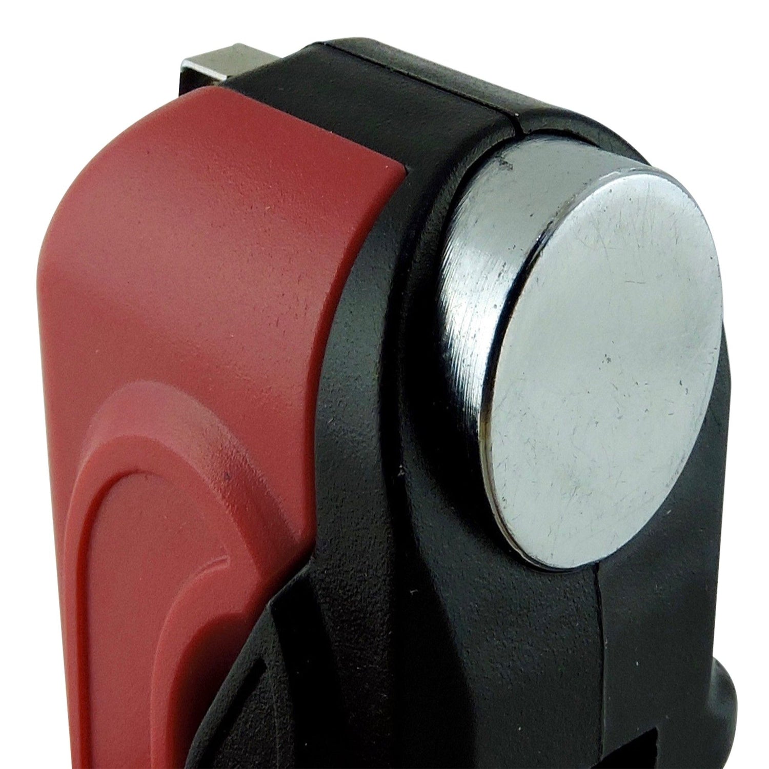 Close-up of a red and black device with a metallic component on a white background