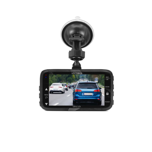 A black Minolta MNCD2K10 2.5K Quad HD dash camera with a 3 inch screen and a windshield mount.