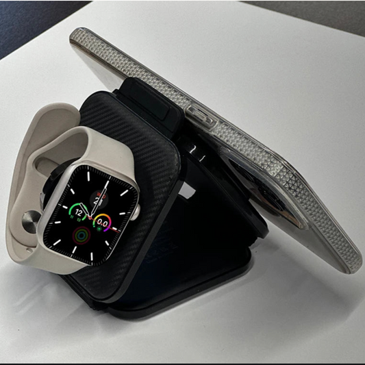 A black wireless charging pad with a built-in magnetic phone stand and nightlight feature.