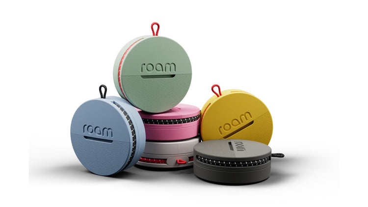 Colorful portable headphones with 'roam' branding on a white background
