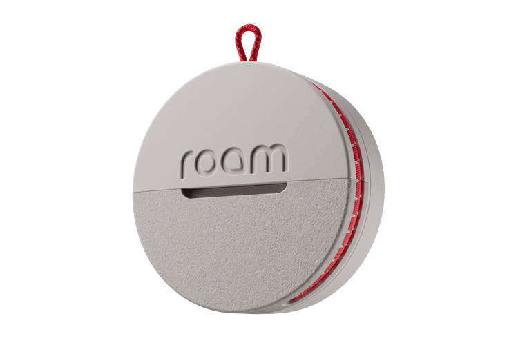 Roam smart tracker single unit in grey color with red loop attachment and red accent stripe, circular GPS tracker with 'roam' branding on transparent background