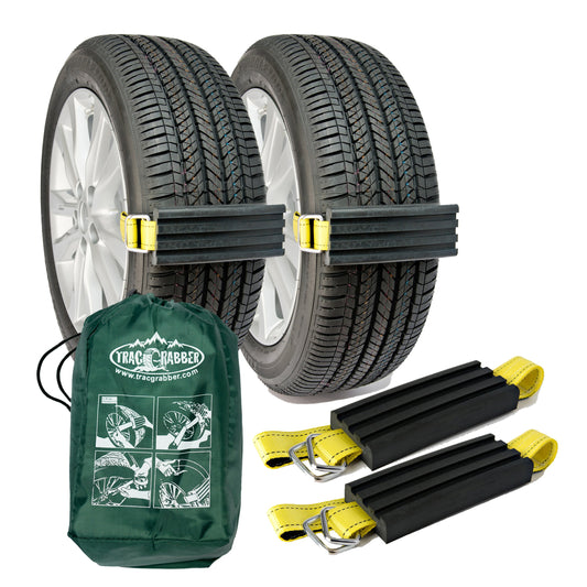 Tire chains with a green bag and straps on a white background