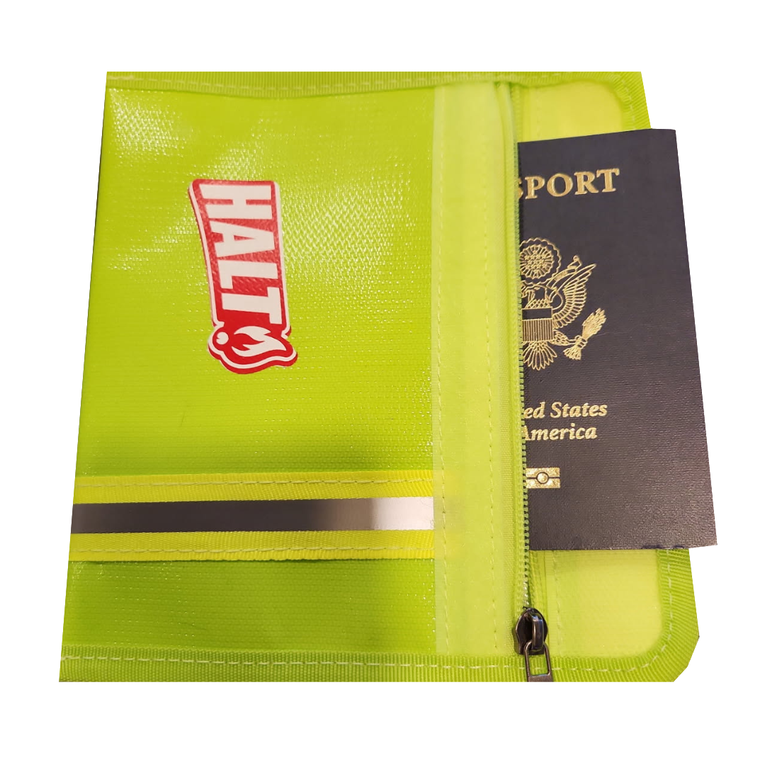 Yellow travel wallet with a passport inside on a white background