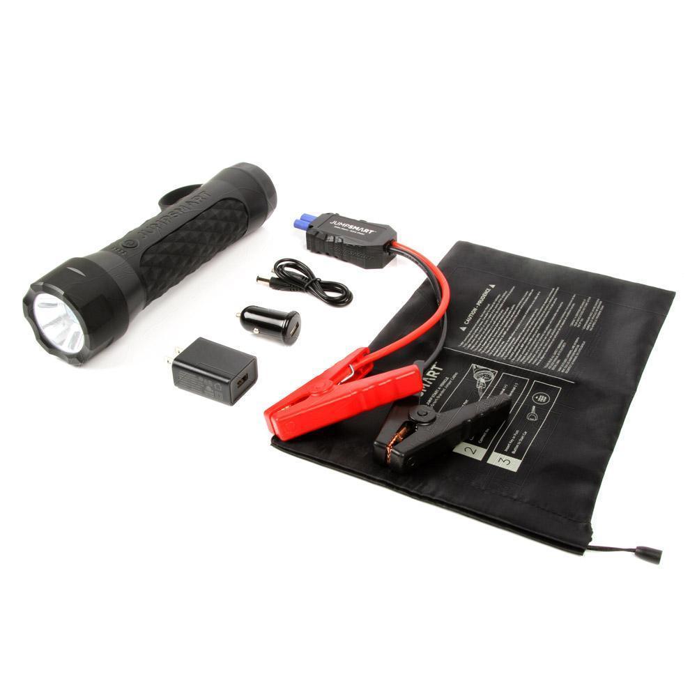 Collection of automotive tools including a flashlight, jump starter, and connectors on a white background.