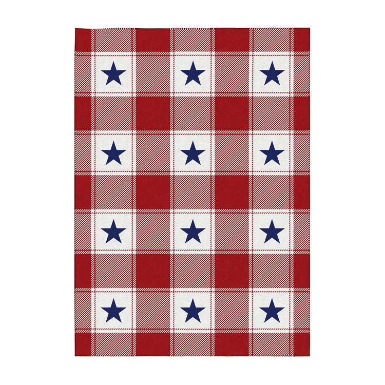 Plaid blanket with blue star pattern on a white background