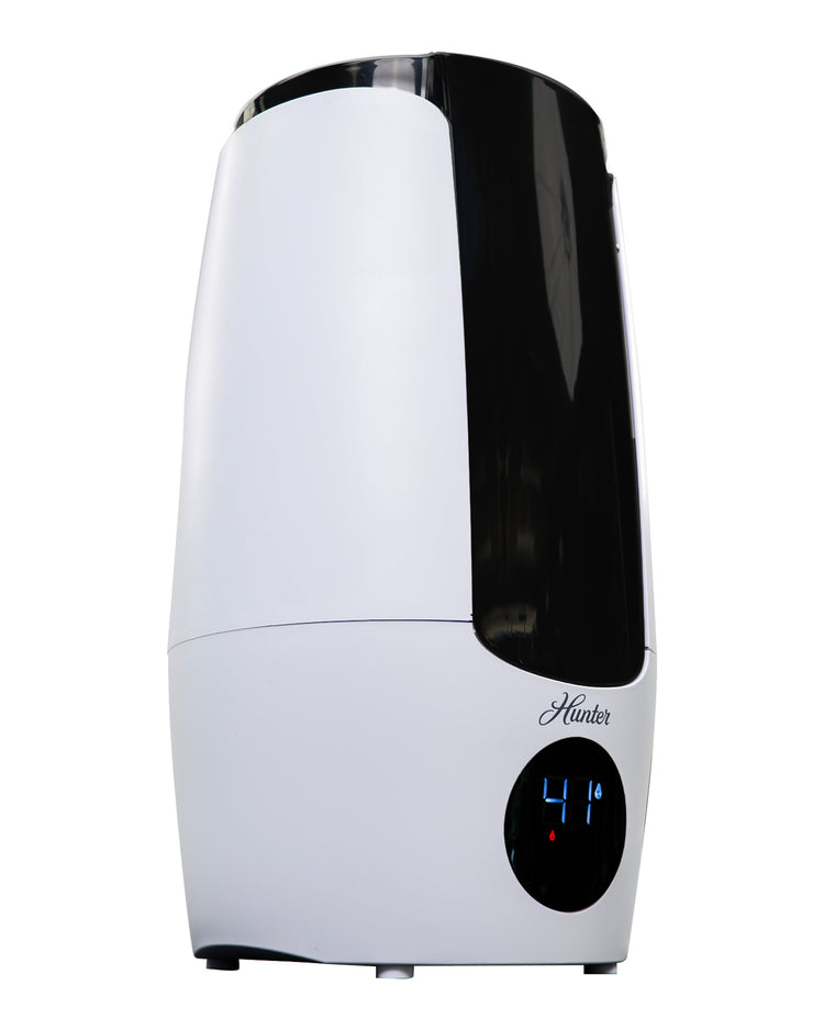 White humidifier with digital display on a white background