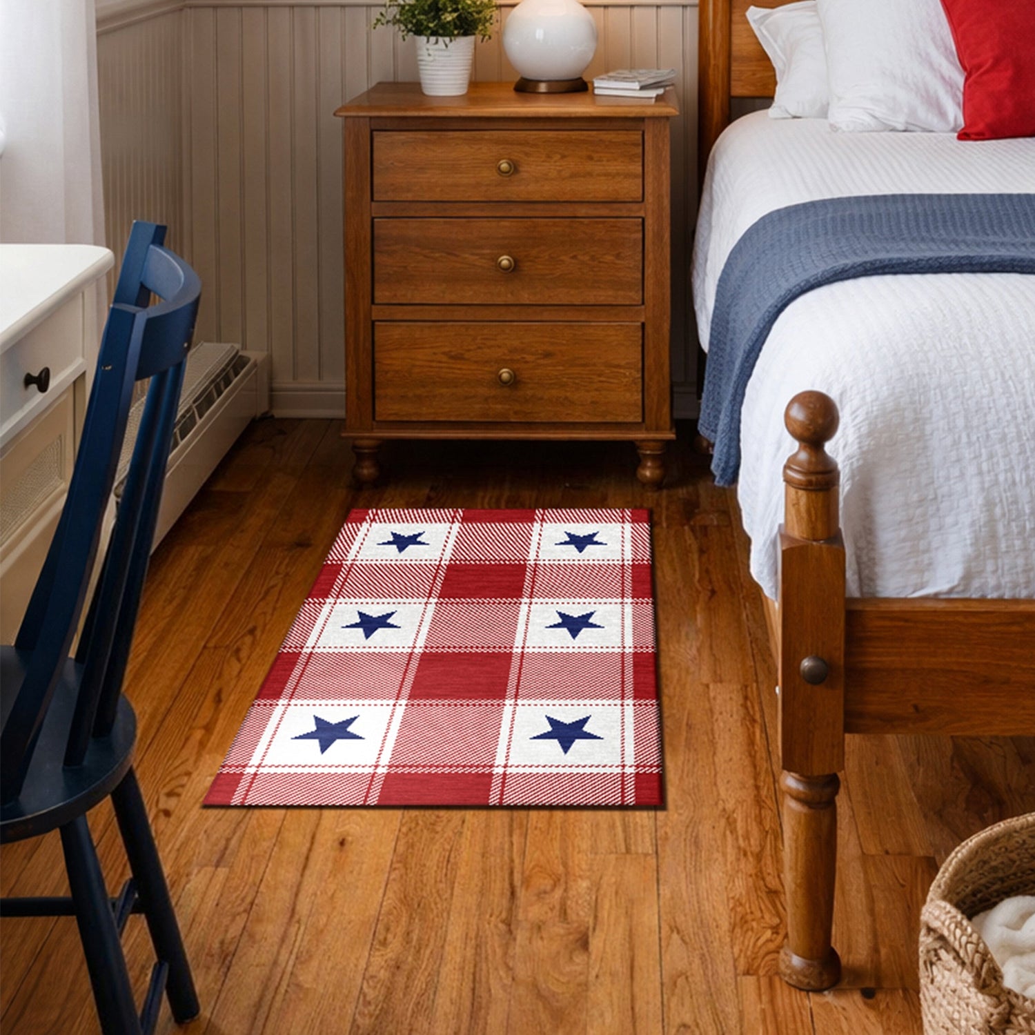 Bedroom with a red and white checkered rug featuring blue stars, wooden nightstand, and bed.