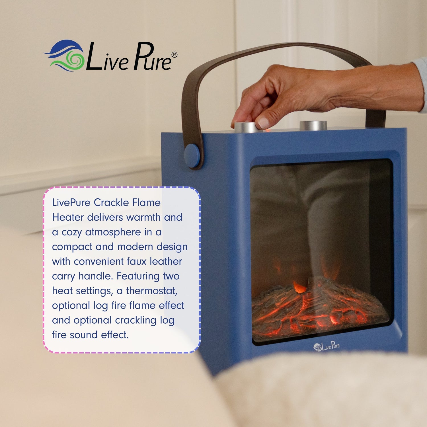 LivePure crackle flame heater with a hand holding it, displaying warm glow inside.