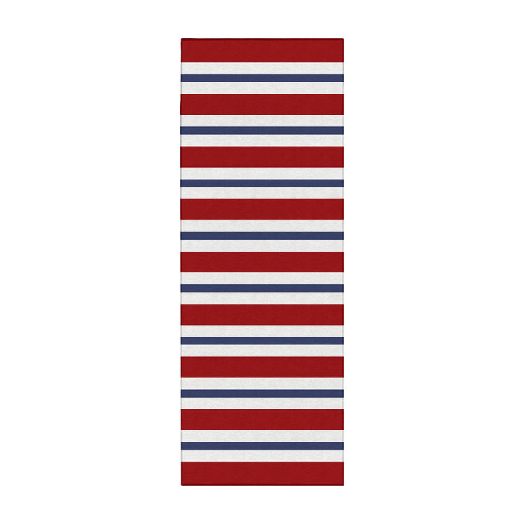 Rectangular mat with red, white, and blue horizontal stripes on a white background