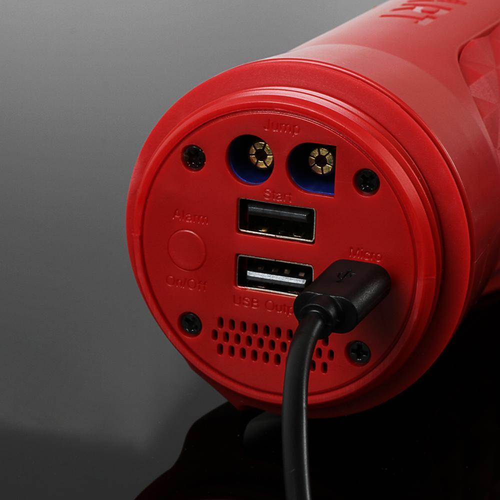 Red cylindrical device with multiple ports on a gray background