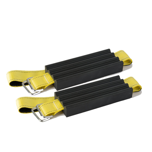 Tire chains with a green bag and straps on a white background