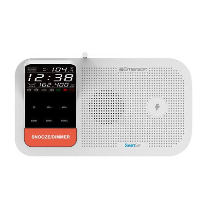 White Emerson clock radio with digital display on a white background